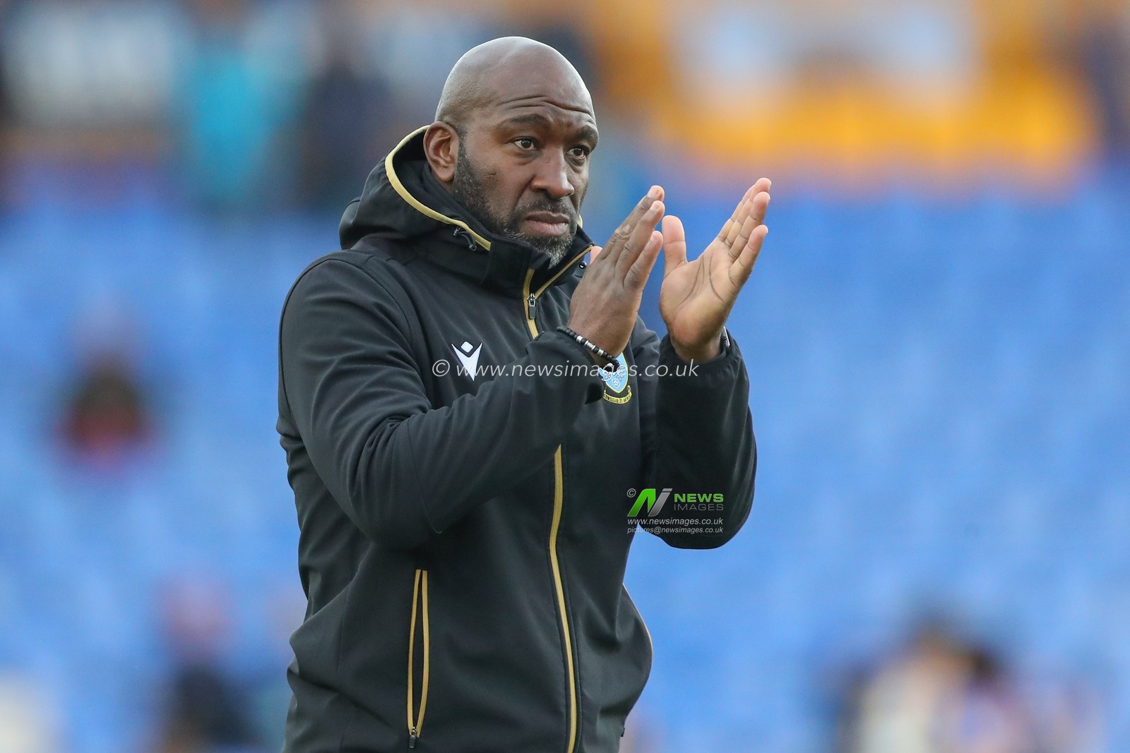 Darren Moore manager of Sheffield Wednesday applauds the travelling fans after the Sky Bet League 1 match Shrewsbury Town vs Sheffield Wednesday at Greenhous Meadow, Shrewsbury, United Kingdom, 29th April 2023

(Photo by Gareth Evans/News Images)
