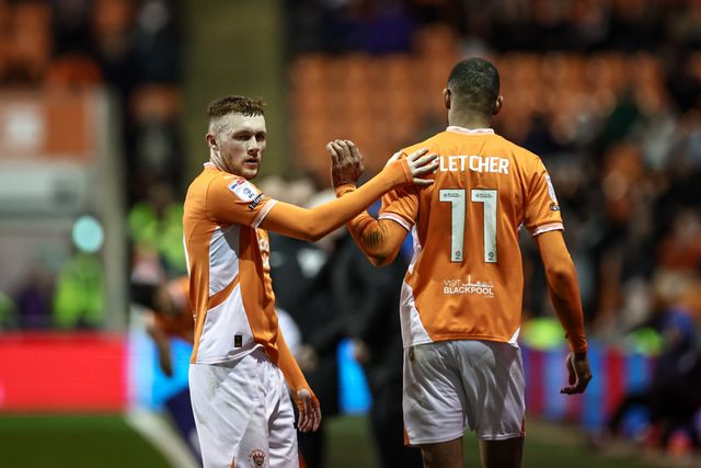 Sonny Carey gives team mate Ashley Fletcher of Blackpool a pat on the back as heâ€™s substituted during the Sky Bet League 1 match Blackpool vs Reading at Bloomfield Road, Blackpool, United Kingdom, 1st April 2025

(Photo by Mark Cosgrove/News Images)