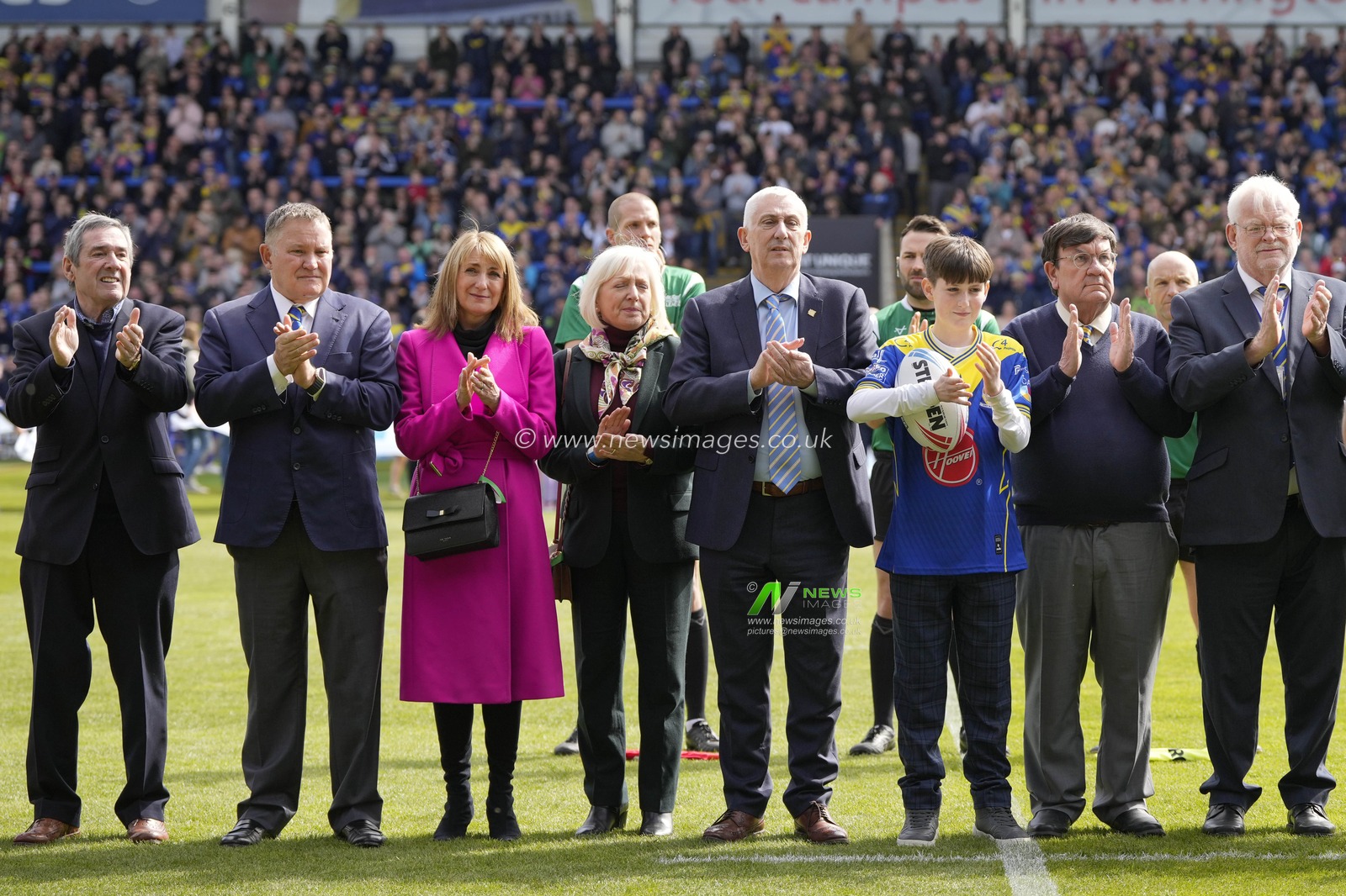Sir Lindsay Hoyle (speaker of the House of Commons) with his family hold a minutes applause in memory of his father Doug Hoyle who died this week before the Betfred Super League Round 8 match Warrington Wolves vs Leigh Leopards at Halliwell Jones Stadium, Warrington, United Kingdom, 20th April 2024

(Photo by Steve Flynn/News Images)