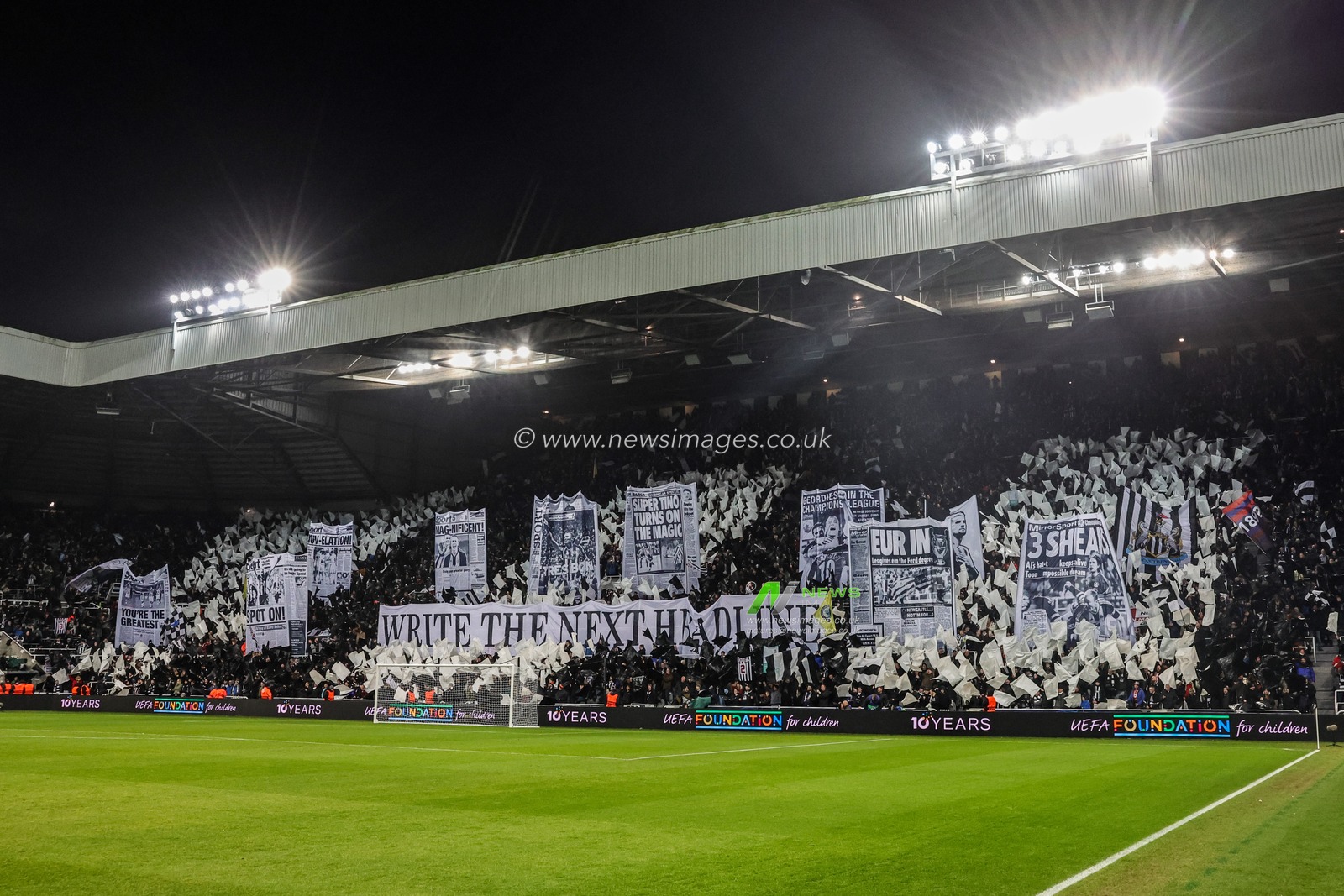 Newcastle fans hold up flags before the game during the UEFA Champions League Matchday 7 of 8 Newcastle United v PSV Eindhovenn at St. James's Park, Newcastle, United Kingdom, 21st January 2026

(Photo by Mark Cosgrove/News Images)