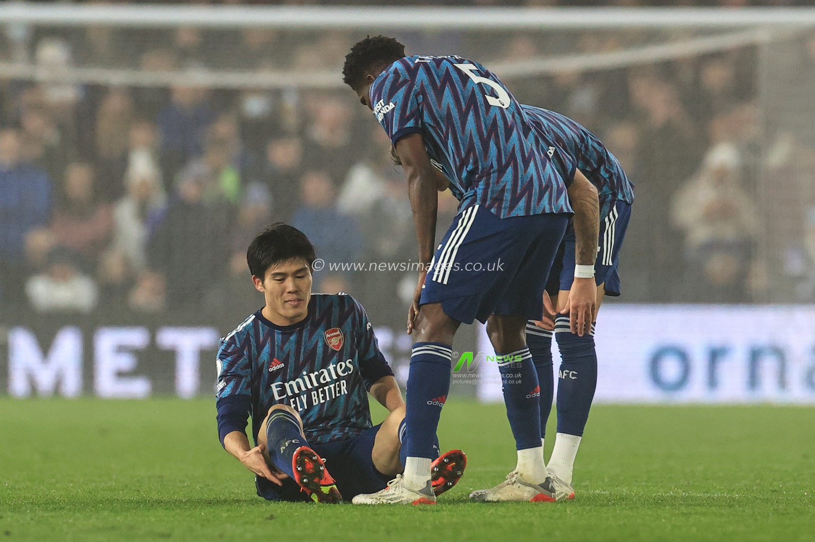 Takehiro Tomiyasu #18 of Arsenal, injured