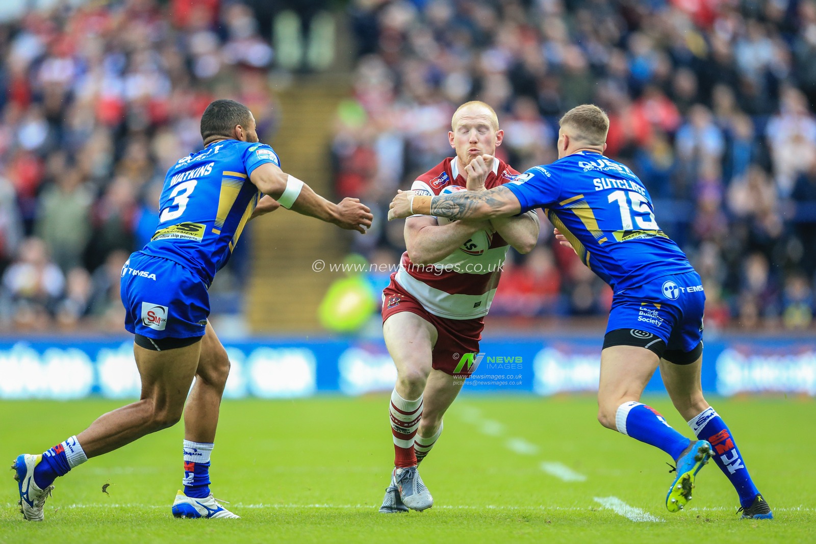 14th June 2019 , Emerald Headingley Stadium, England; Betfred Super League, Round 18, Leeds Rhinos vs Wigan Warriors ; Laim Farrell (12) of Wigan Warriors is tackled by Liam Sutcliffe (15) of Leeds Rhinos 


Credit: Mark Cosgrove/News Images
