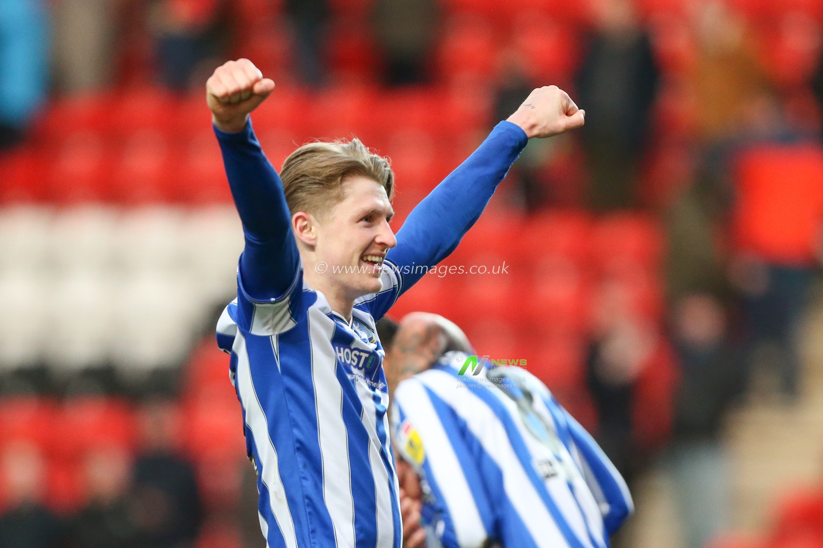 George Byers #14 of Sheffield Wednesday celebrates with the fans at the final whistle during the Sky Bet League 1 match Charlton Athletic vs Sheffield Wednesday at The Valley, London, United Kingdom, 25th February 2023

(Photo by Arron Gent/News Images)