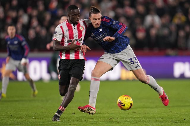Riccardo Calafiori of Arsenal and Michael Kayode of Brentford battle during the Premier League match Brentford vs Arsenal at GTECH Community Stadium, London, United Kingdom on 12 February 2026

(Photo by Harvey Murphy/News Images)