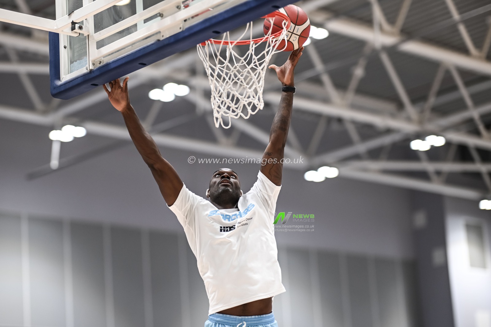 Tayo Ogedengbe of Surrey Scorchers during pre match warm ups ahead of the British Basketball Championship match Cheshire Phoenix vs Surrey Scorchers at Ellesmere Port Sports Village, Ellesmere Port, United Kingdom, 19th November 2023

(Photo by Craig Thomas/News Images)