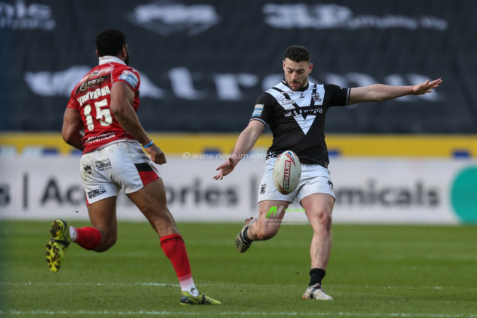 Jake Connor (1) of Hull FC puts up a big kick