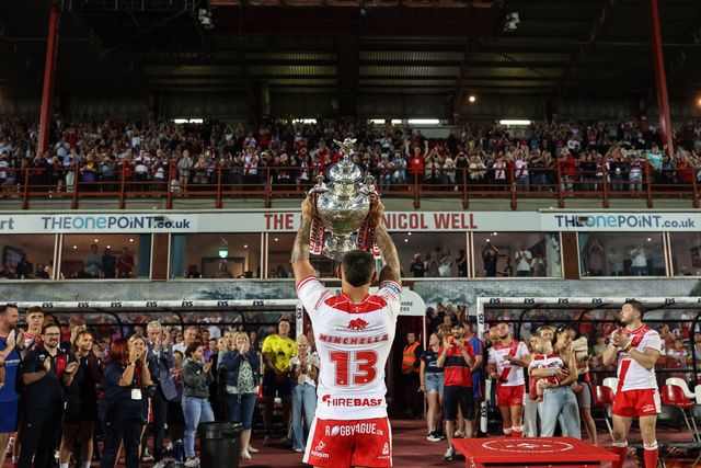Elliot Minchella of Hull KR lifts the Challenge Cup inferno of packed out  Sewell Group Craven Park during the Betfred Super League Round 14 Hull KR vs Catalans Dragons at Sewell Group Craven Park, Kingston upon Hull, United Kingdom, 13th June 2025

(Photo by Mark Cosgrove/News Images)
