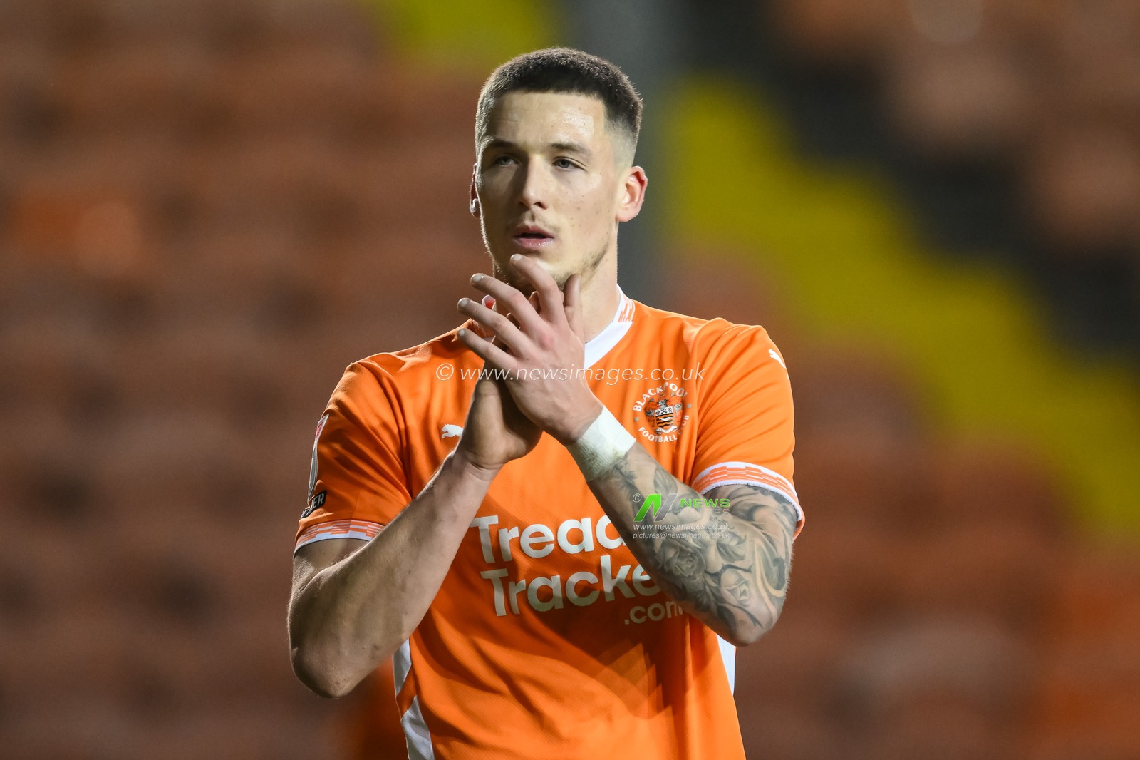 Oliver Casey of Blackpool applauds the fans at the end of the  Sky Bet League 1 match Blackpool vs Stevenage at Bloomfield Road, Blackpool, United Kingdom, 21st December 2024

(Photo by Craig Thomas/News Images)