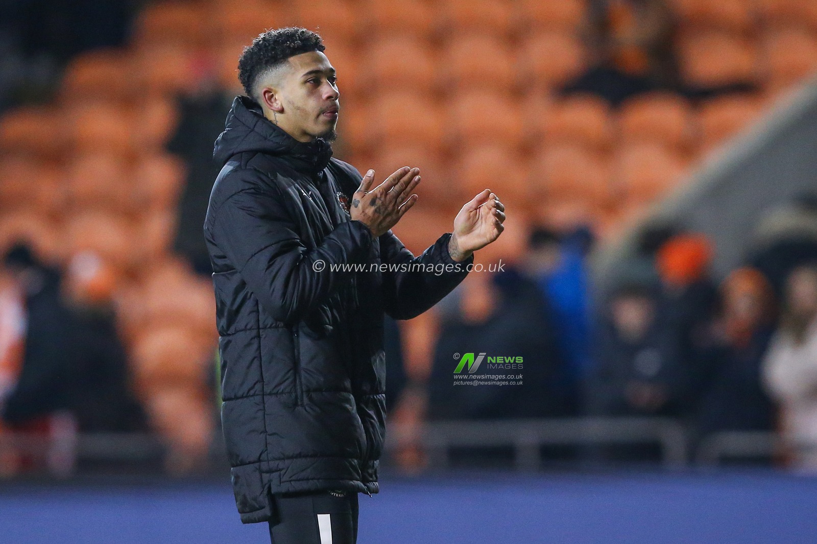Jordan Lawrence-Gabriel of Blackpool applauds the home fans after the Emirates FA Cup Third Round Replay match Blackpool vs Nottingham Forest at Bloomfield Road, Blackpool, United Kingdom, 17th January 2024

(Photo by Gareth Evans/News Images)
