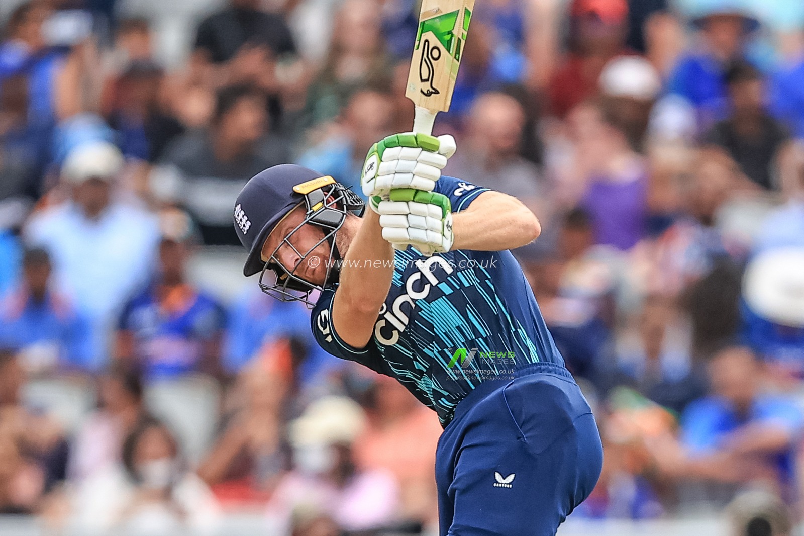 Jos Buttler of England hits a six (6)