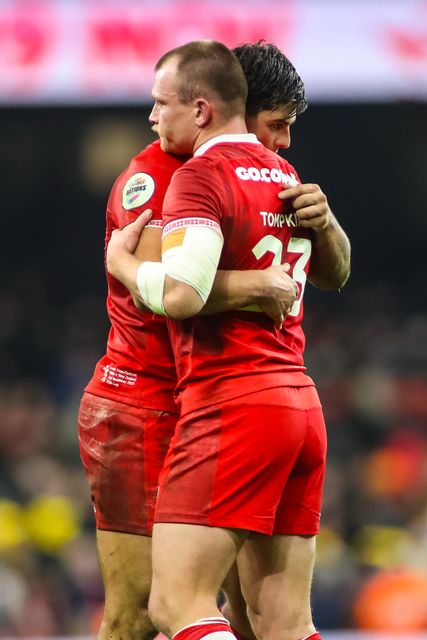 Louis Rees-Zammit and Nick Tompkins of Wales embrace during the Quilter Nations Series 2025 match Wales vs New Zealand at Principality Stadium, Cardiff, United Kingdom, 22nd November 2025

(Photo by Andrew Lewis/News Images)

*** GER AUT SUI OUT ***