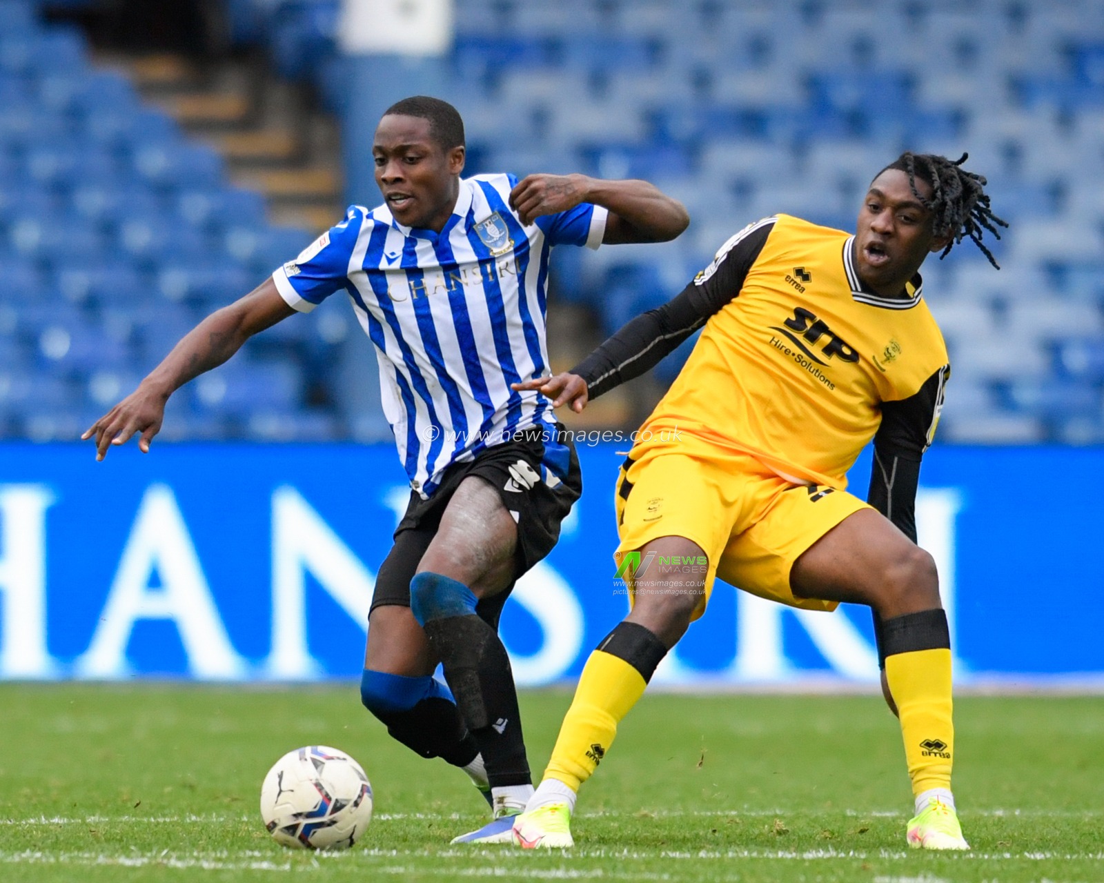 Dennis Adeniran #8 of Sheffield Wednesday starts an attacking move