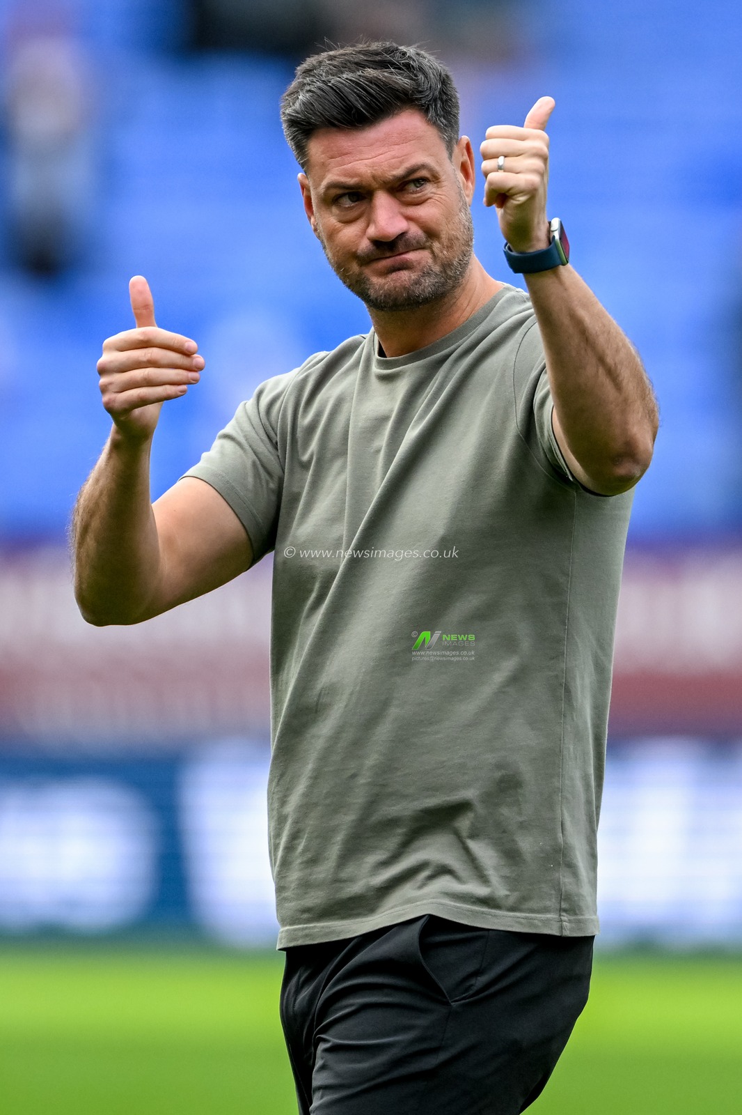 Johnnie Jackson, manager of AFC Wimbledon, acknowledges the travelling supporters during the Sky Bet League 1 match Bolton Wanderers vs AFC Wimbledon at Toughsheet Community Stadium, Bolton, United Kingdom, 6th September 2025

(Photo by Adam Gee/News Images)