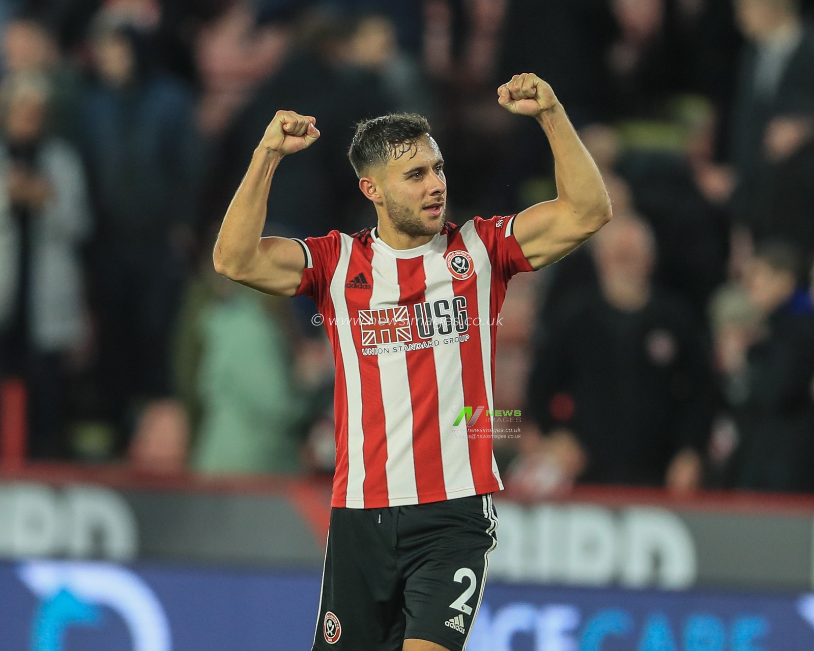 21st October 2019, Bramall Lane, Sheffield, England; Premier League, Sheffield United v Arsenal : George Baldock (2) of Sheffield United applauds the fans as Sheffield United win Arsenal 1-0 

Credit: Mark Cosgrove/News Images