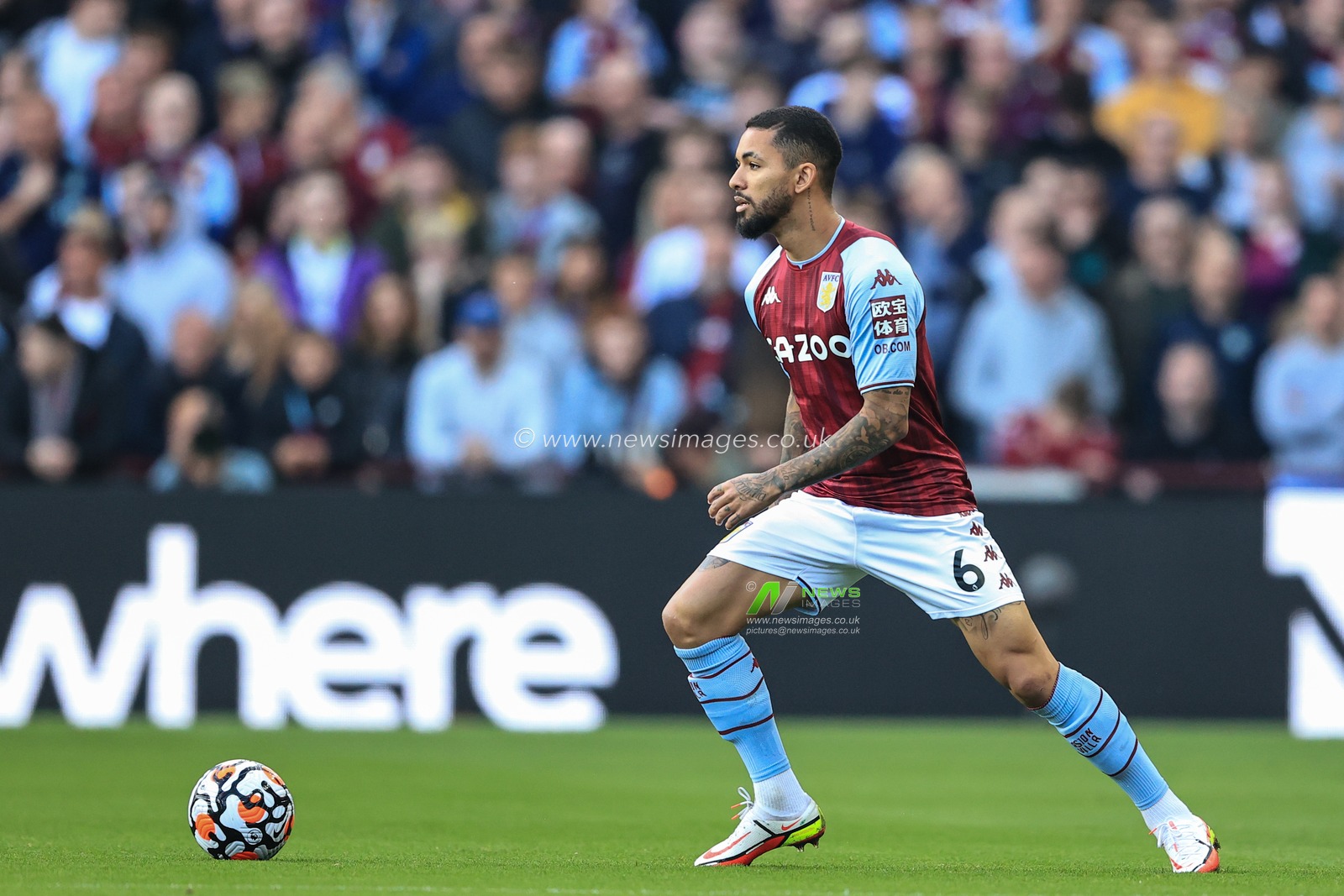 Douglas Luiz #6 of Aston Villa in action during the game