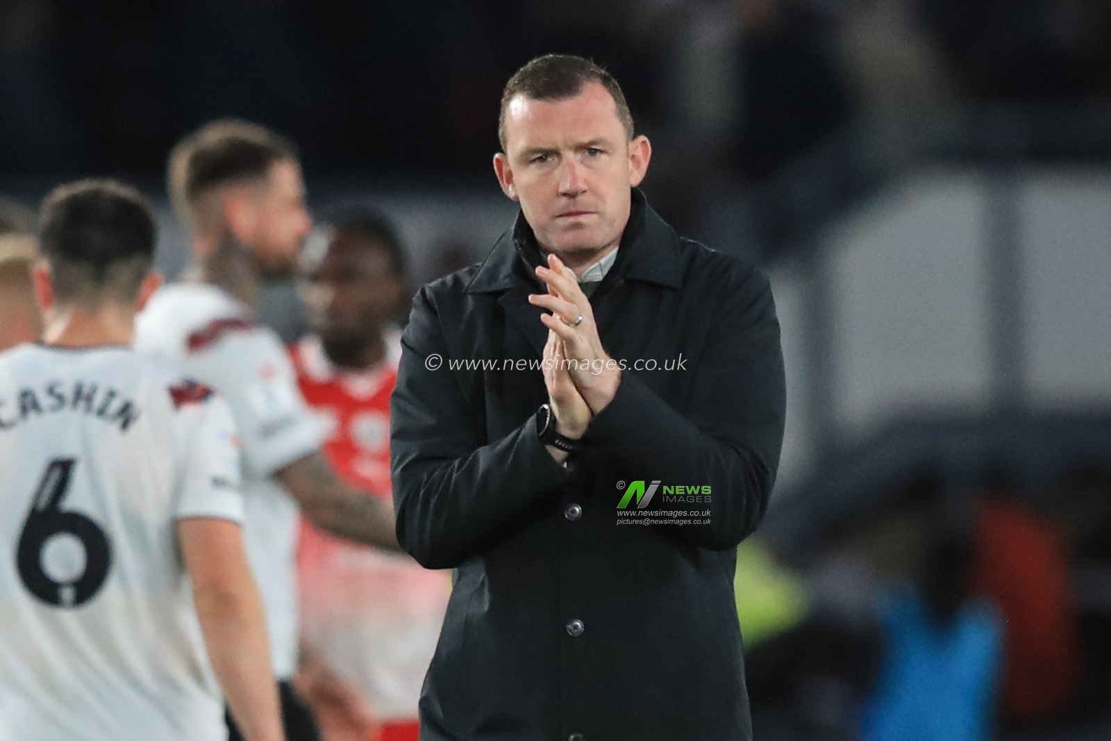 Neill Collins Head coach of Barnsley applauds the travelling fans during the Sky Bet League 1 match Derby County vs Barnsley at Pride Park Stadium, Derby, United Kingdom, 11th November 2023

(Photo by Alfie Cosgrove/News Images)