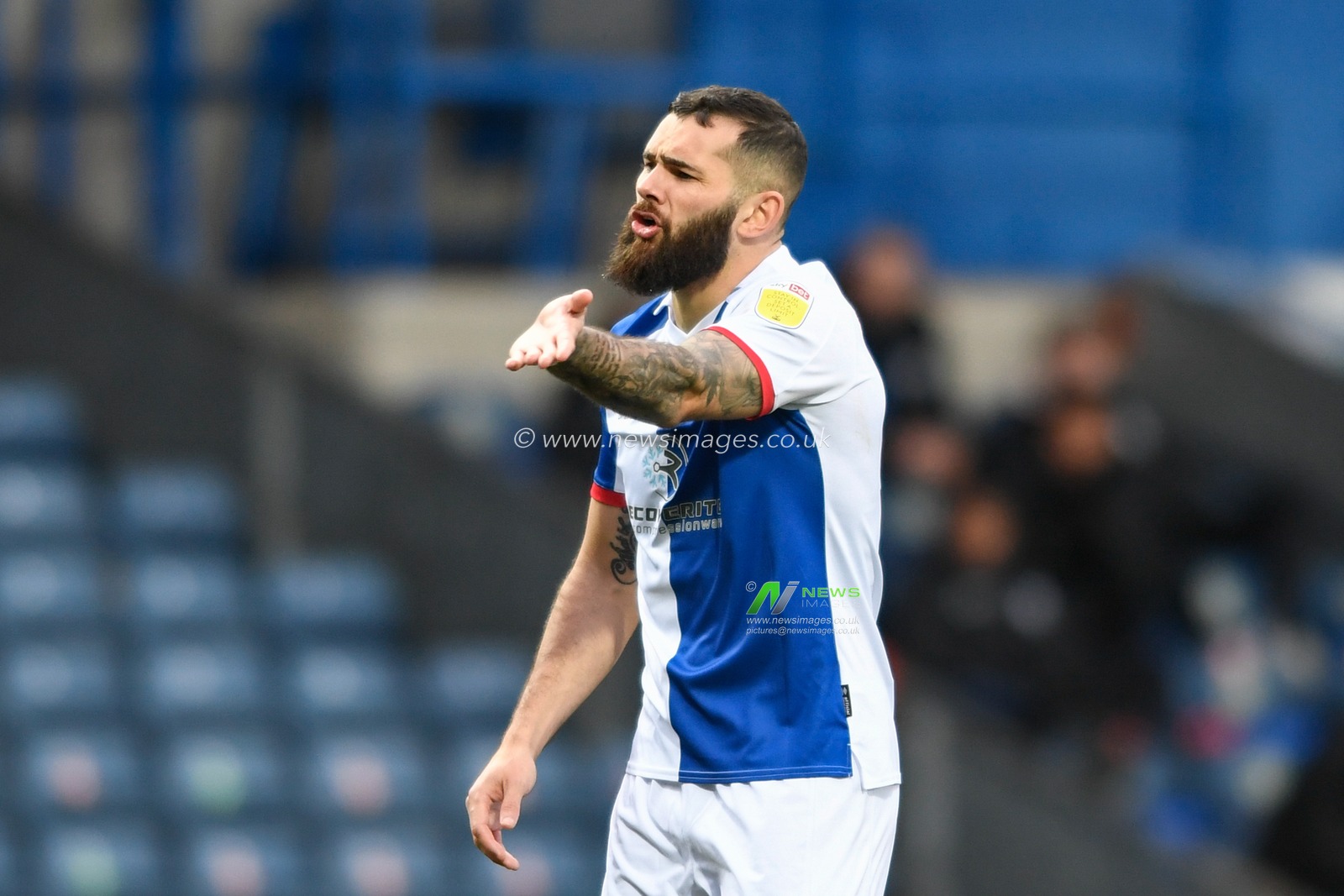 Bradley Johnson #4 of Blackburn Rovers appeals for a decision
