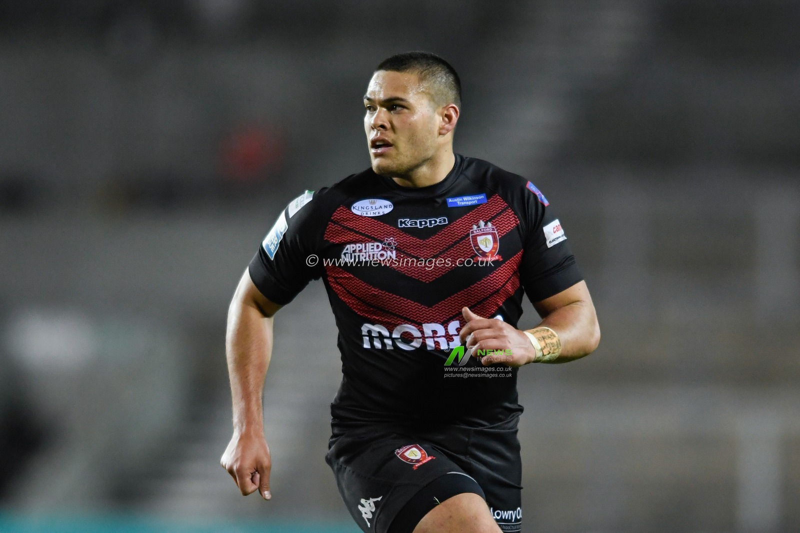 Tui Lolohea (6) of Salford Red Devils in action during the game