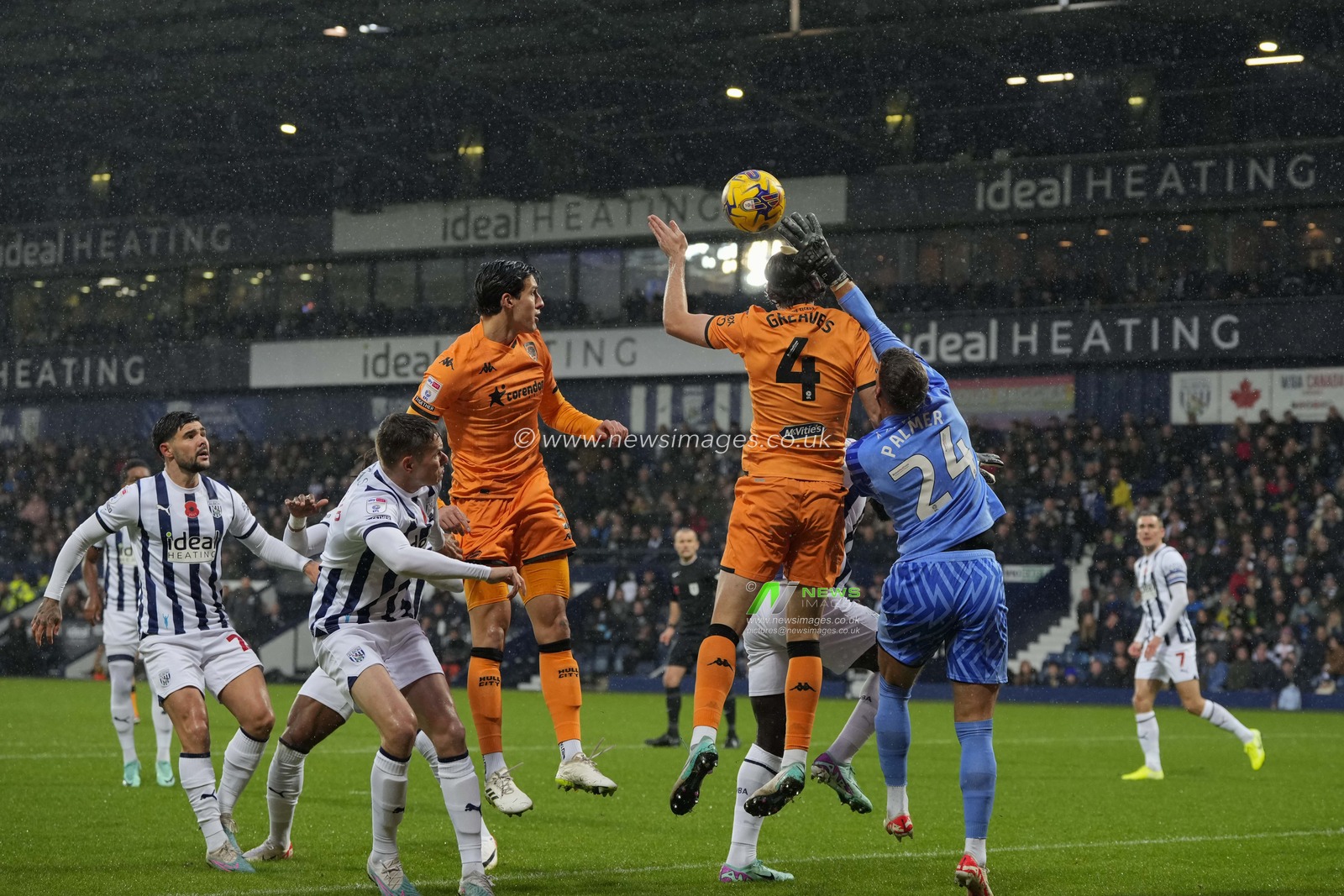 Alex Palmer #24 of West Bromwich Albion punches clear under pressure from Jacob Greaves #4 of Hull City during the Sky Bet Championship match West Bromwich Albion vs Hull City at The Hawthorns, West Bromwich, United Kingdom, 4th November 2023

(Photo by Steve Flynn/News Images)