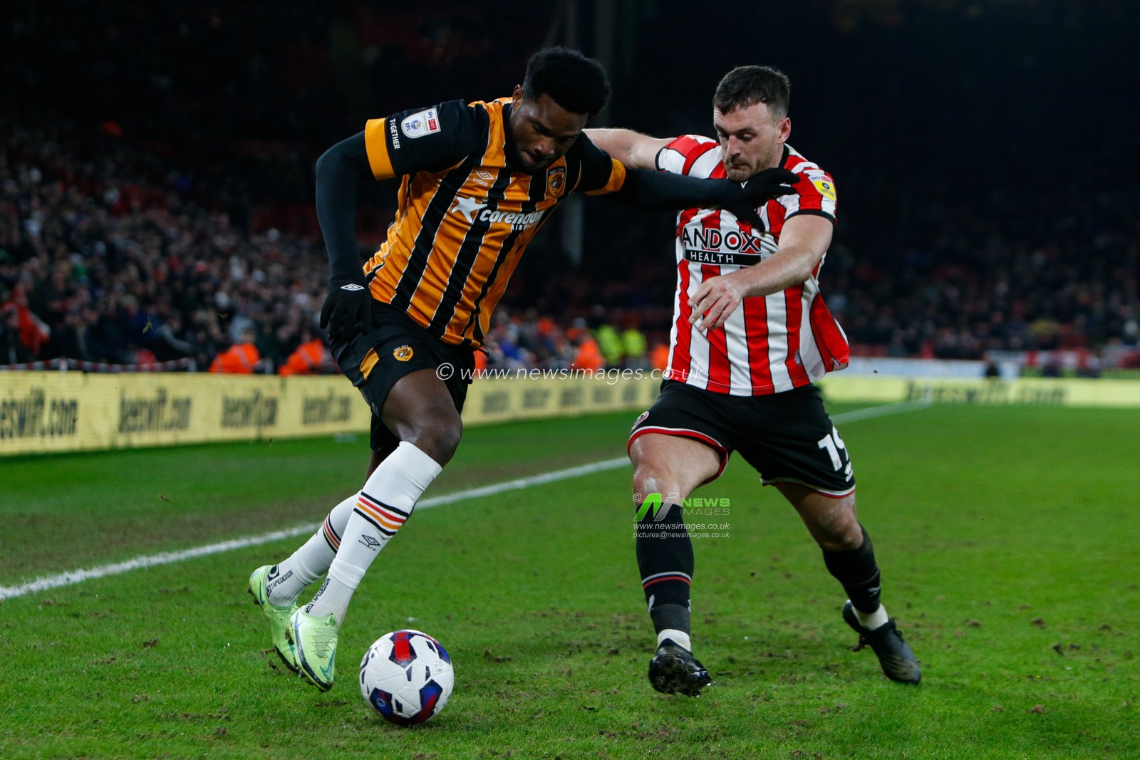 Benjamin Tetteh #30 of Hull City and Jack Robinson #19 of Sheffield United during the Sky Bet Championship match Sheffield United vs Hull City at Bramall Lane, Sheffield, United Kingdom, 20th January 2023

(Photo by Ben Early/News Images)
