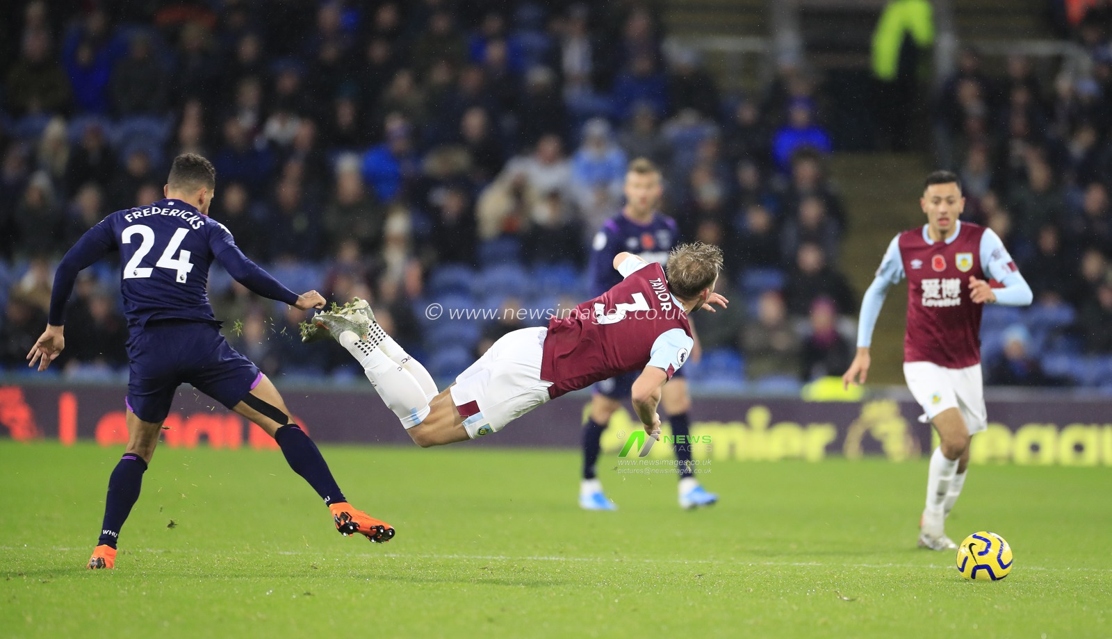 9th November 2019, Turf Moor, Burnley, England; Premier League, Burnley v West Ham United : Charlie Taylor (3) of Burnley is fouled by Ryan Fredericks (24) of West Ham United for which Federicks is booked

Credit: Conor Molloy/News Images