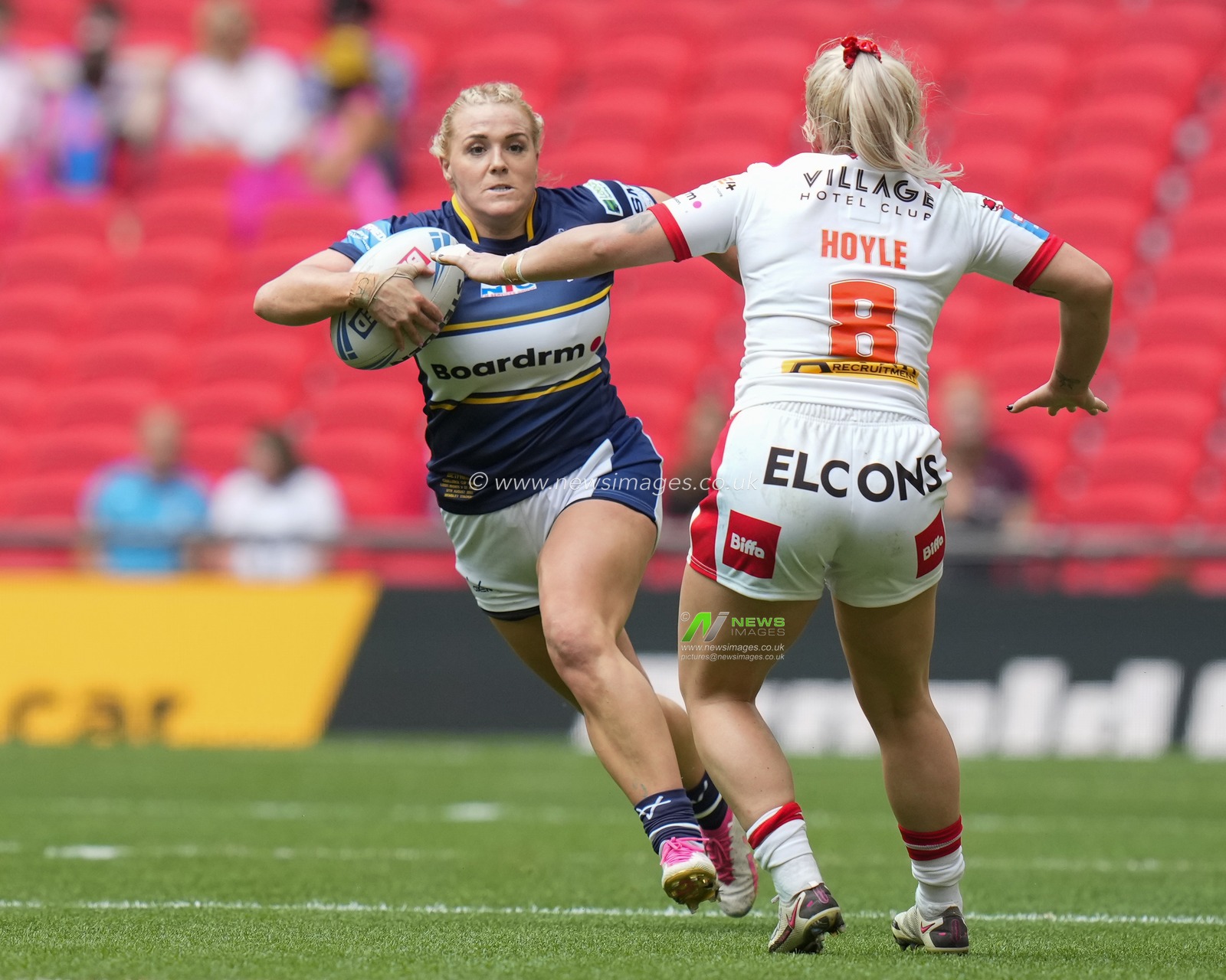 Amy Hardcastle #11 of Leeds Rhinos runs at Shona Hoyle #8 of St. Helens during the Betfred Womens Challenge Cup Final match Leeds Rhinos vs St Helens at Wembley Stadium, London, United Kingdom, 12th August 2023

(Photo by Steve Flynn/News Images)