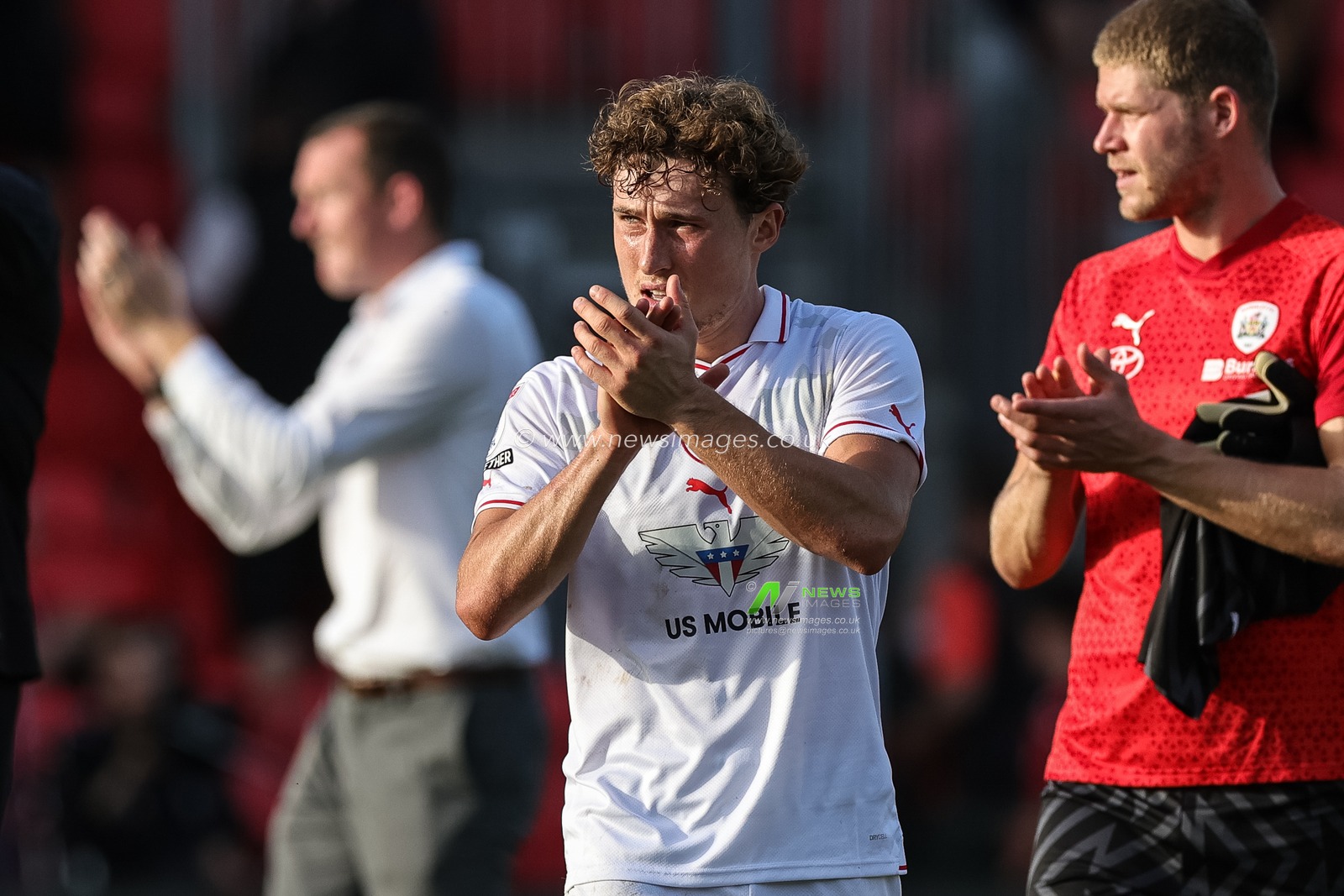 Callum Styles #20 of Barnsley celebrates the 0-1 win with the traveling fans during the Sky Bet League 1 match Exeter City vs Barnsley at St James' Park, Exeter, United Kingdom, 7th October 2023

(Photo by Mark Cosgrove/News Images)
