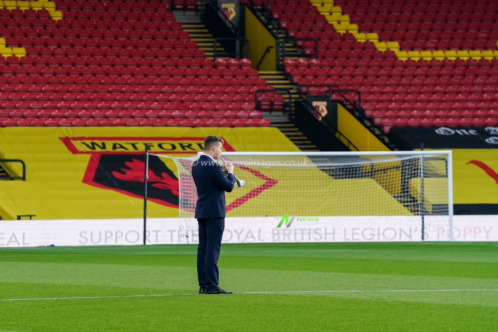 The last post is played by a bugler as the teams observe a minutes reflection ahead of next weeks Remembrance Day