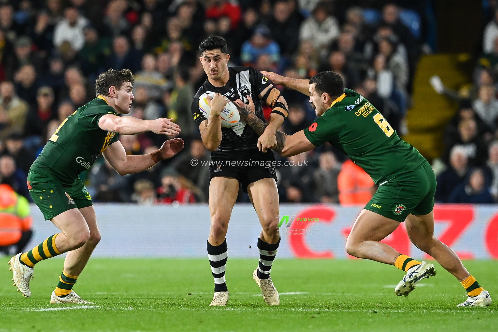 Dylan Brown of New Zealand is tackled by Reagan Campbell-Gillard of Australia during the Rugby League World Cup 2021 Semi Final match Australia vs New Zealand at Elland Road, Leeds, United Kingdom, 11th November 2022

(Photo by Craig Thomas/News Images)