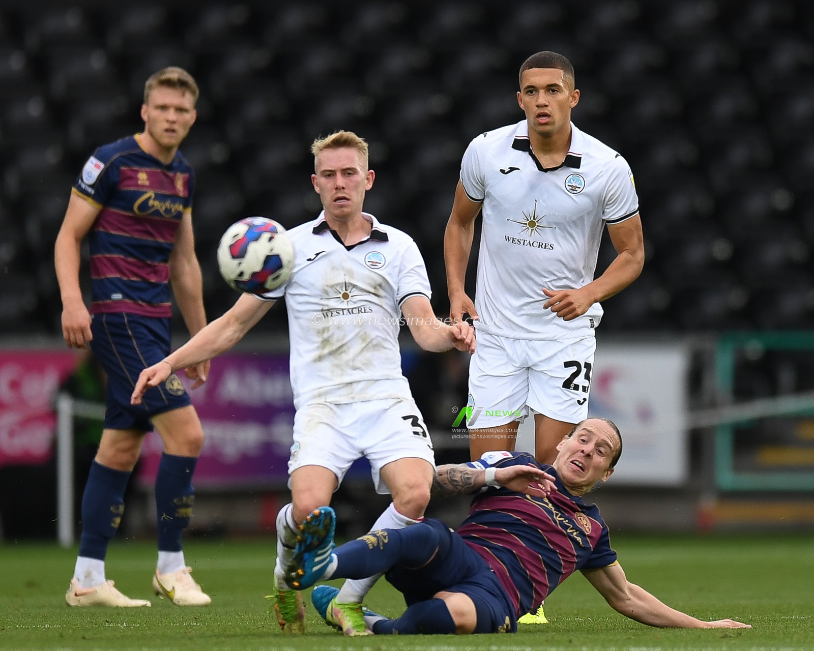 Ollie Cooper #31 of Swansea City tackled by Stefan Johansen #6 of QPR during the Sky Bet Championship match Swansea City vs Queens Park Rangers at Swansea.com Stadium, Swansea, United Kingdom, 3rd September 2022

(Photo by Mike Jones/News Images)