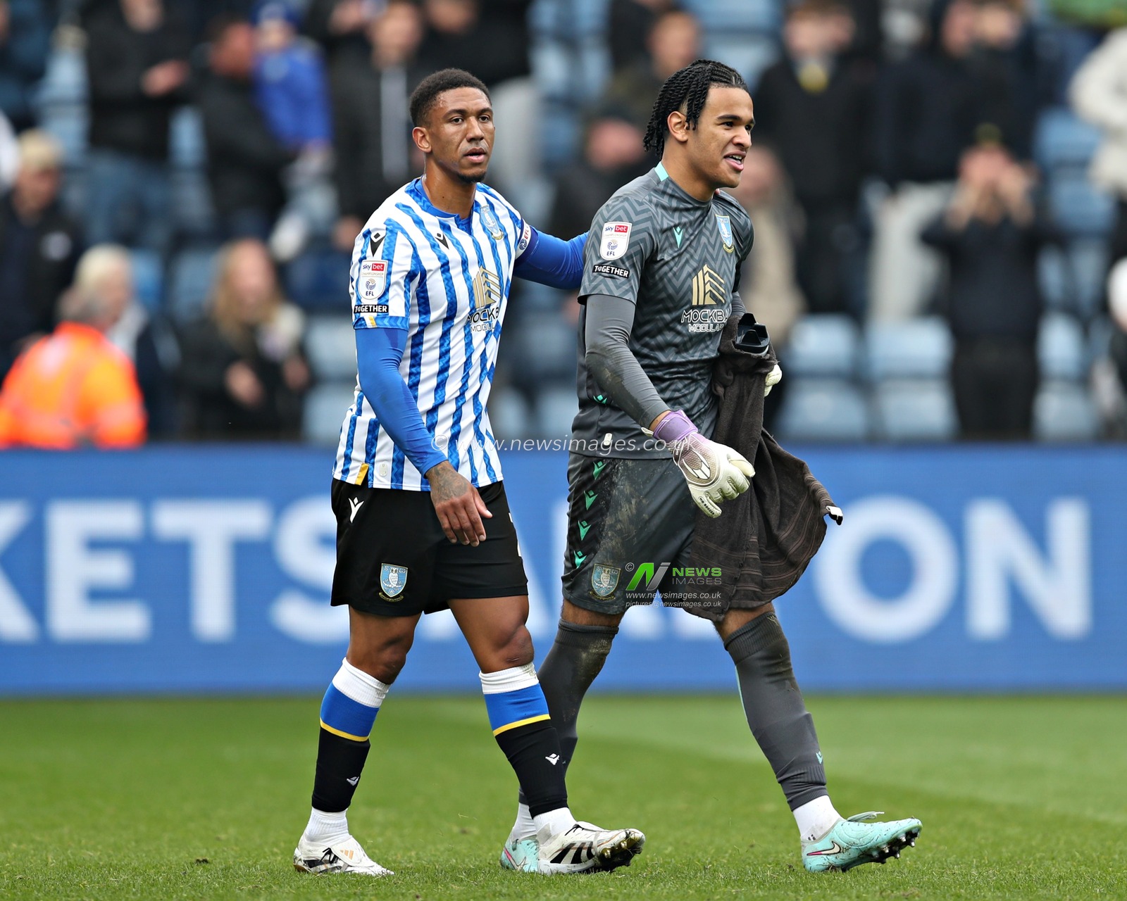 Liam Palmer of Sheffield Wednesday and Pierce Charles of Sheffield Wednesday after the Sky Bet Championship match Sheffield Wednesday vs Middlesbrough at Hillsborough, Sheffield, United Kingdom, 21st April 2025

(Photo by Sam Eaden/News Images)