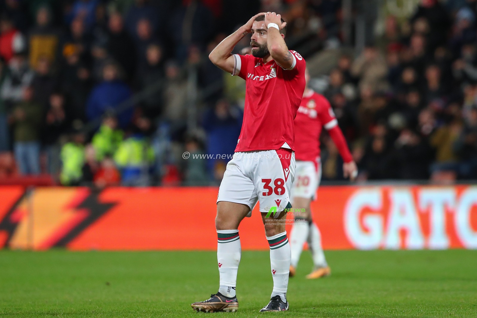 Elliot Lee #38 of Wrexham reacts during the Sky Bet League 2 match Wrexham vs Newport County at SToK Cae Ras, Wrexham, United Kingdom, 23rd December 2023

(Photo by Gareth Evans/News Images)