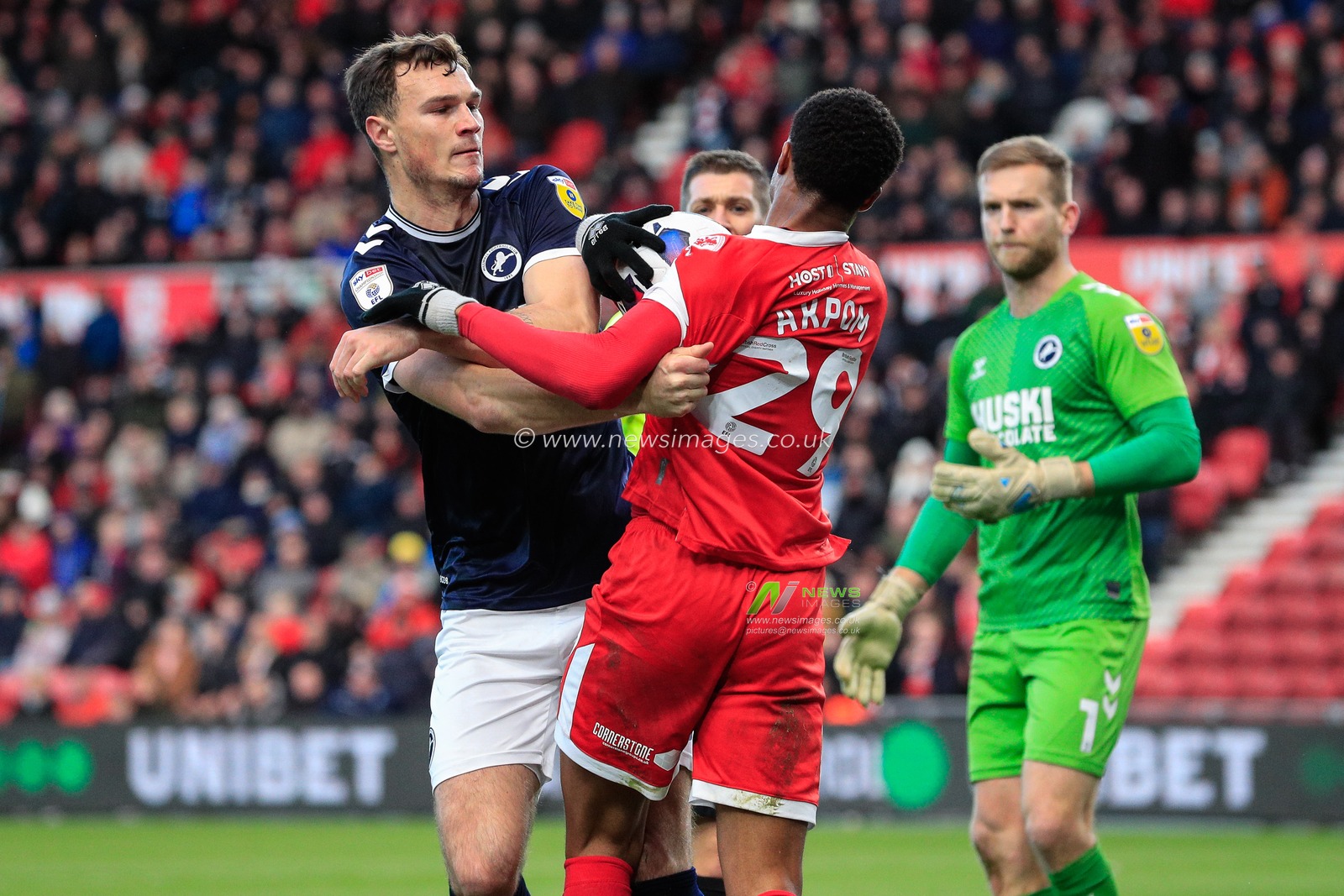 Jake Cooper #5 of Millwall and Chuba Akpom #29 of Middlesbrough come to blows during the Sky Bet Championship match Middlesbrough vs Millwall at Riverside Stadium, Middlesbrough, United Kingdom, 14th January 2023

(Photo by James Heaton/News Images)