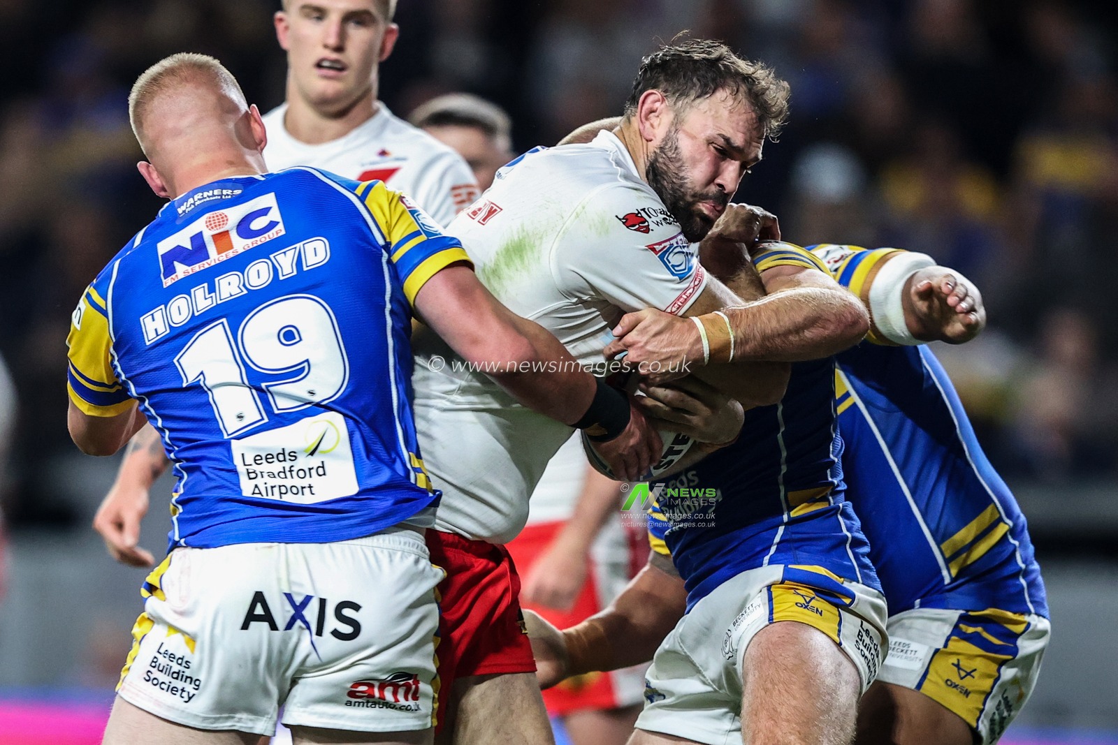 Alex Walmsley of St. Helens is tackled during the Betfred Super League play-off Eliminator 1 match Leeds Rhinos vs St Helens at Headingley Stadium, Leeds, United Kingdom, 27th September 2025

(Photo by Alfie Cosgrove/News Images)