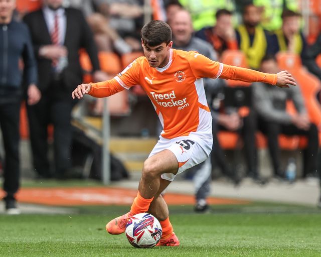 Rob Apter of Blackpool breaks with the ball during the Sky Bet League 1 match Blackpool vs Wrexham at Bloomfield Road, Blackpool, United Kingdom, 21st April 2025

(Photo by Alfie Cosgrove/News Images)