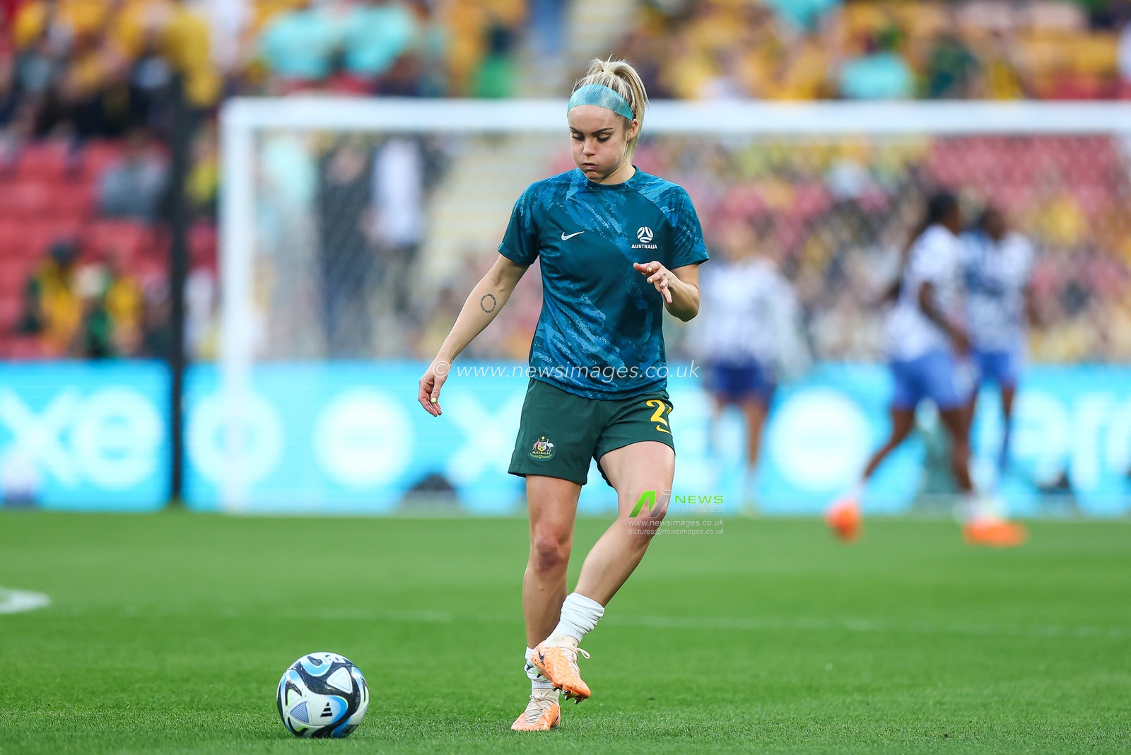 Ellie Carpenter #21 of Australia during the pre-game warmup ahead of the FIFA Women's World Cup 2023 Quarter-Final match Australia Women vs France Women at Suncorp Stadium, Brisbane, Australia, 12th August 2023

(Photo by Patrick Hoelscher/News Images)