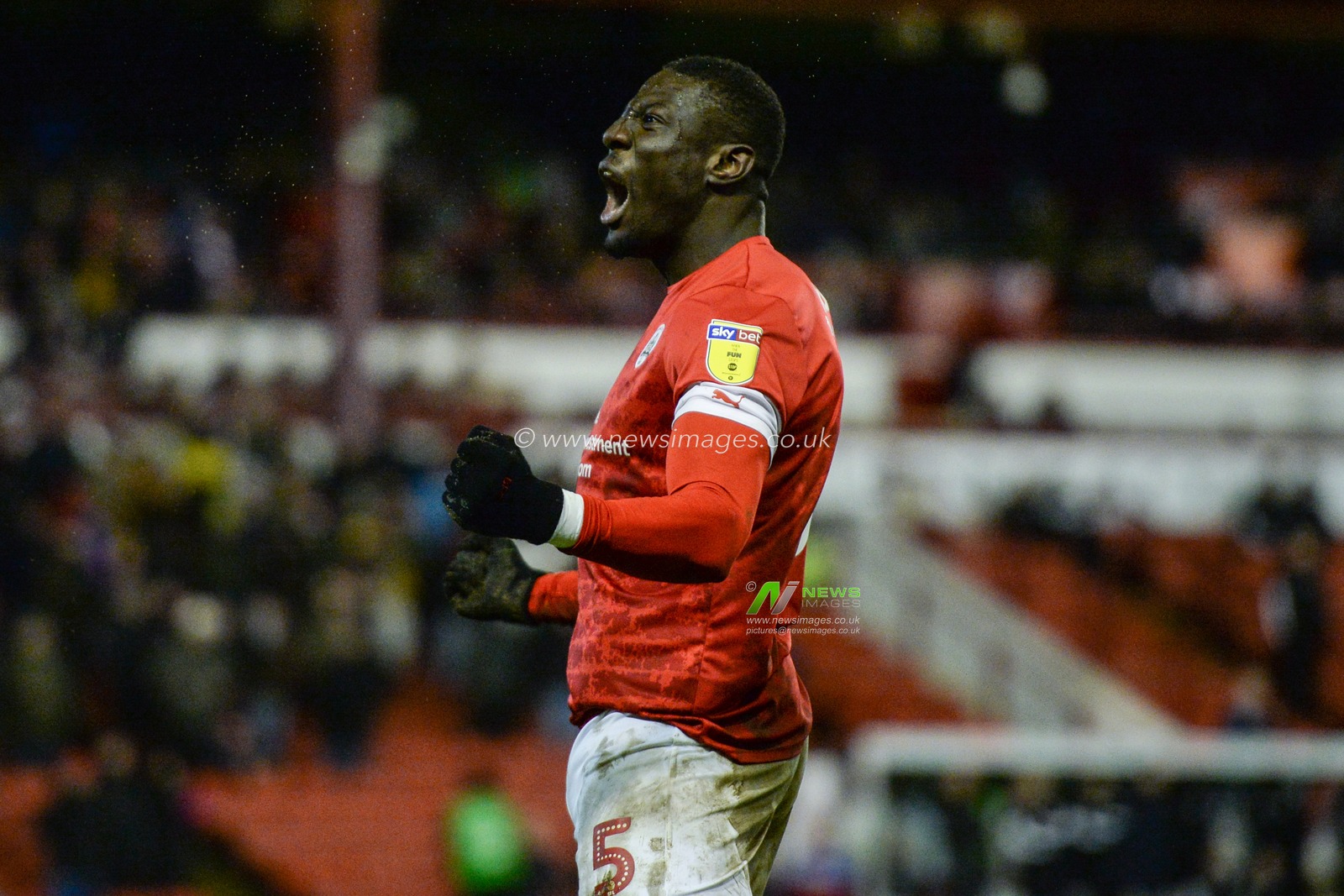 14th December 2019, Oakwell, Barnsley, England; Sky Bet Championship, Barnsley v Queens Park Rangers :Bambo Diaby (5) of Barnsley FC celebrates his goal to make it 5-2 

Credit: Dean Williams/News Images