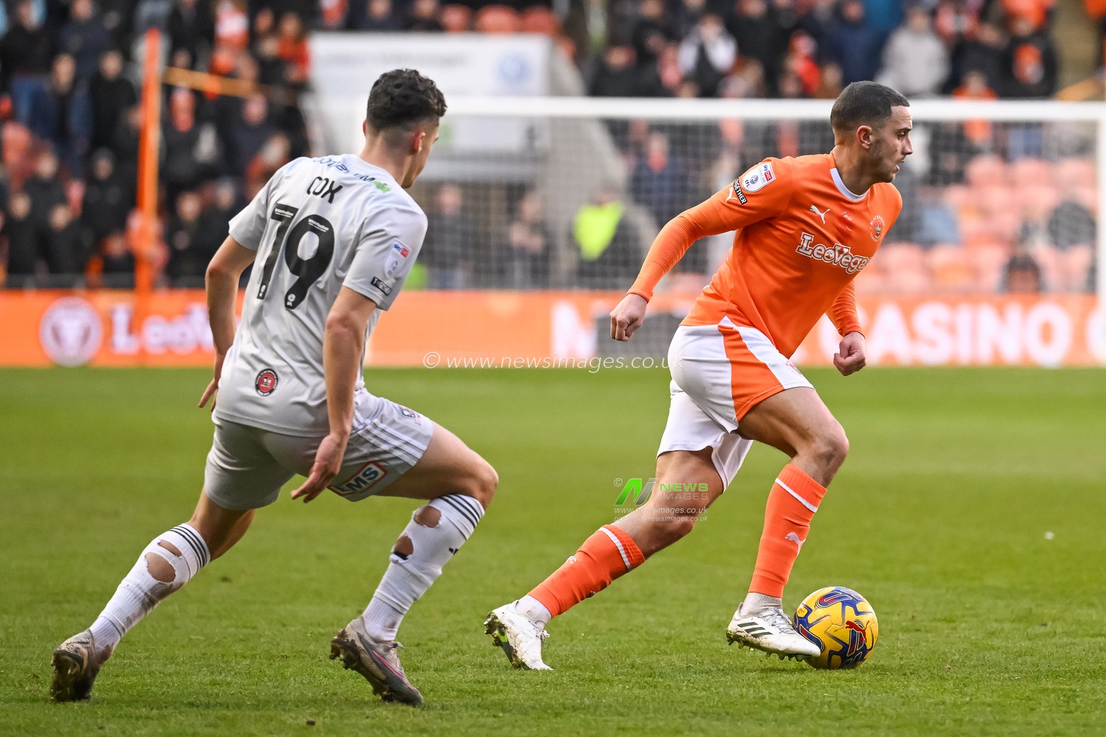 Oliver Norburn of Blackpool makes a break with the ball during the Sky Bet League 1 match Blackpool vs Exeter City at Bloomfield Road, Blackpool, United Kingdom, 13th January 2024

(Photo by Craig Thomas/News Images)