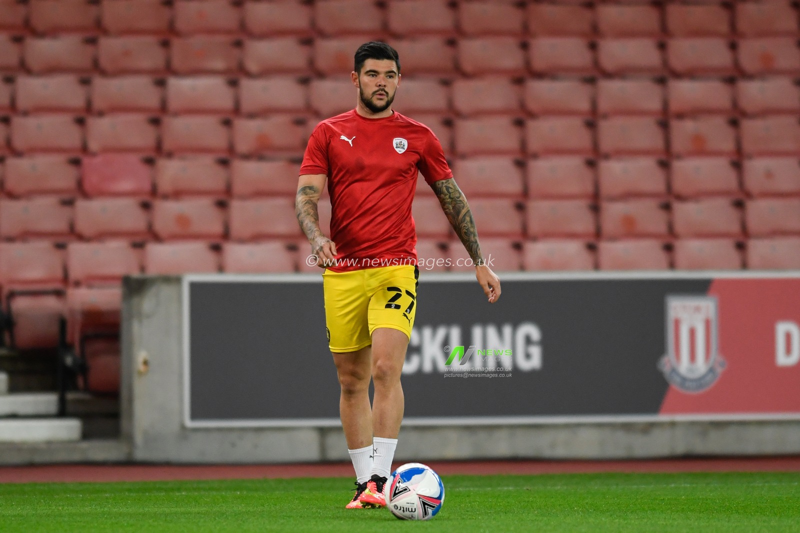 Alex Mowatt (27) of Barnsley warming up before the game