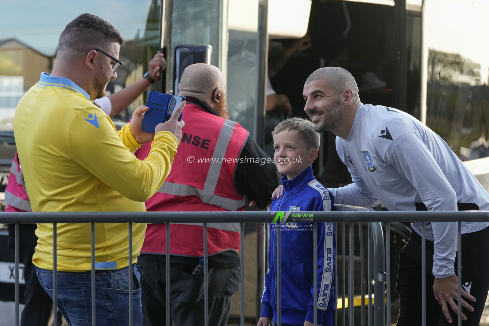 Callum Paterson of Sheffield Wednesday poses for a photo with a young fan as he arrives at the stadium before the Sky Bet League 1 match Morecambe vs Sheffield Wednesday at Mazuma Stadium, Morecambe, United Kingdom, 13th September 2022

(Photo by Steve Flynn/News Images)