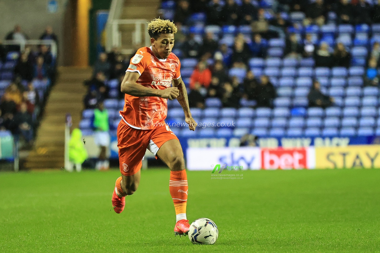 Jordan Gabriel #4 Of Blackpool breaks with the ball