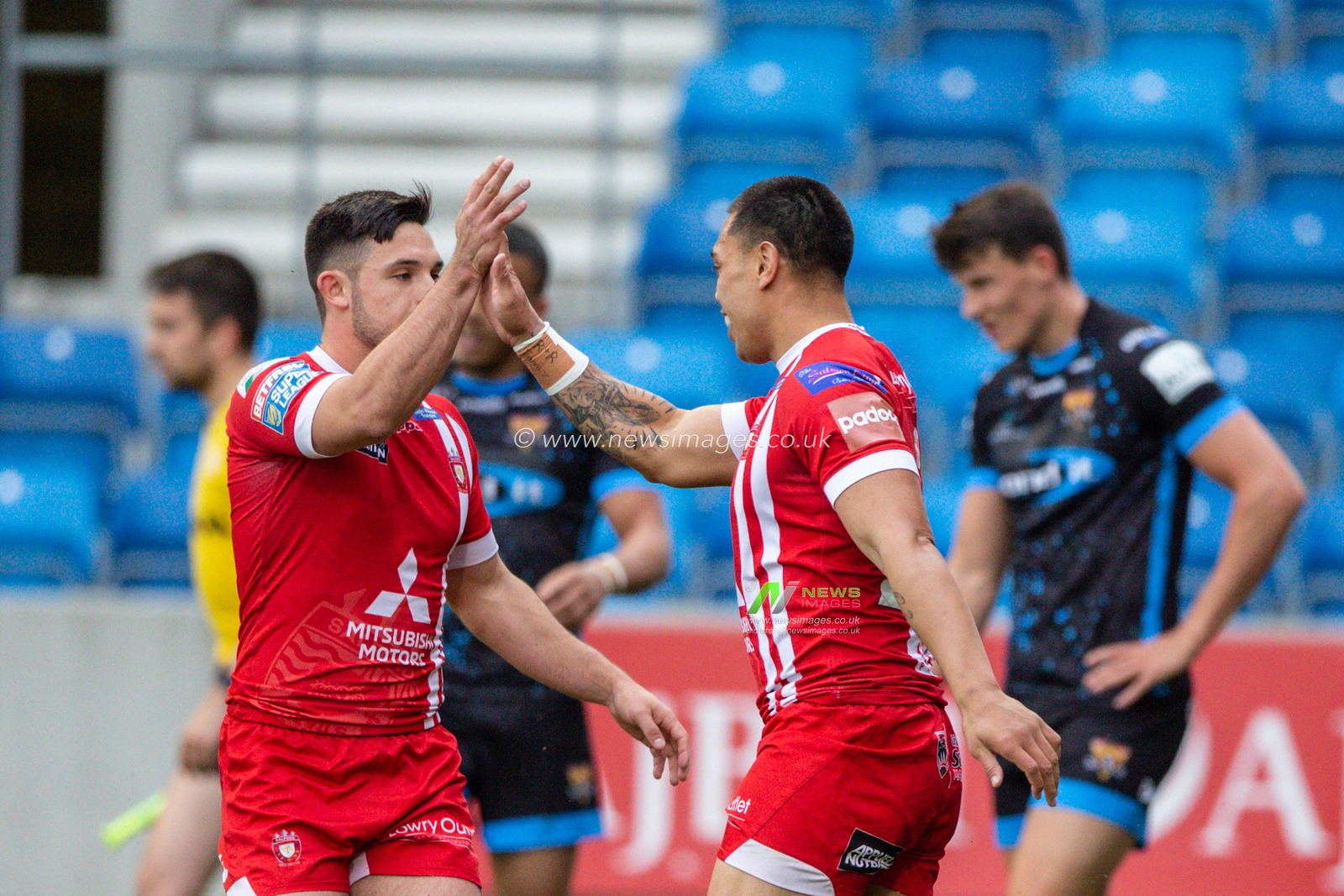 4th July 2019 ,  AJ Bell Stadium, Salford, England;  Betfred Super League, Round 21, Salford Red Devils vs Huddersfield Giants ; Ken Sio (23) of Salford Red Devils celebrates his try 

Credit: Mark Cosgrove/News Images