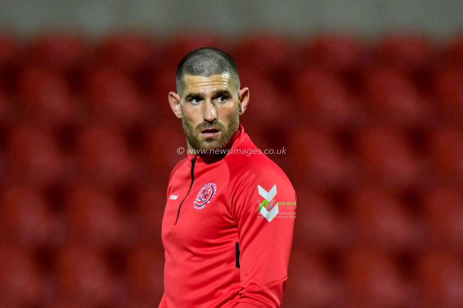 Ched Evans (9) of Fleetwood Town warming up