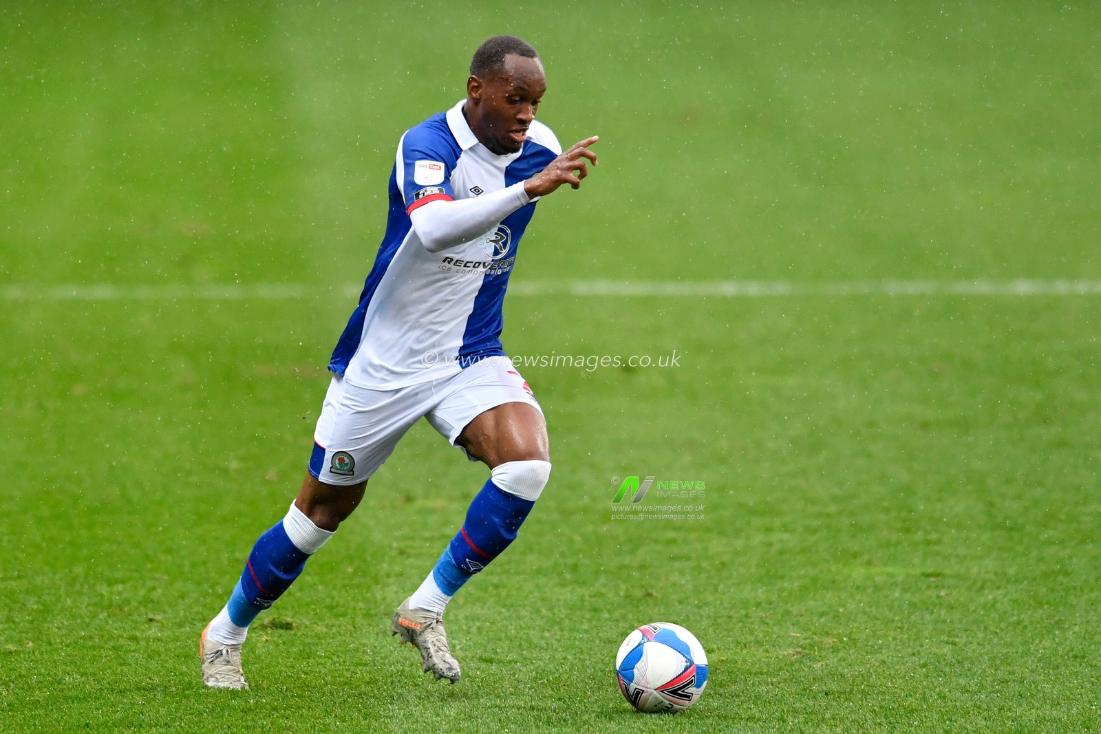 Ryan Nyambe (2) of Blackburn Rovers runs forward with the ball