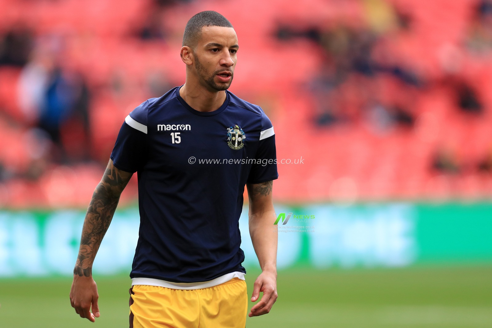 Craig Eastmond #15 of Sutton United warms up.
