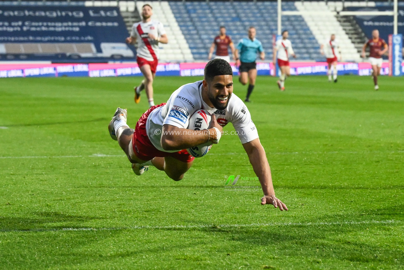 Nene Macdonald of Salford Red Devils goes over for a try during the Betfred Super League Round 10 match Huddersfield Giants vs Salford Red Devils at John Smith's Stadium, Huddersfield, United Kingdom, 3rd May 2024

(Photo by Craig Thomas/News Images)