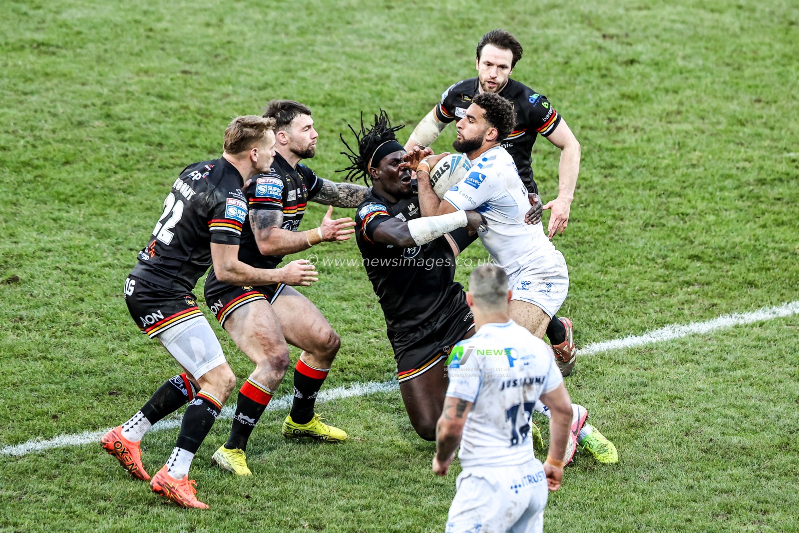 Benjamin Laguerre of Toulouse Olympique is tackled by Eribe Doro of Bradford Bulls during the Betfred Super League match Bradford Bulls vs Toulouse at Odsal Stadium, Bradford, United Kingdom on 01 March 2026

(Photo by Alfie Cosgrove/News Images)