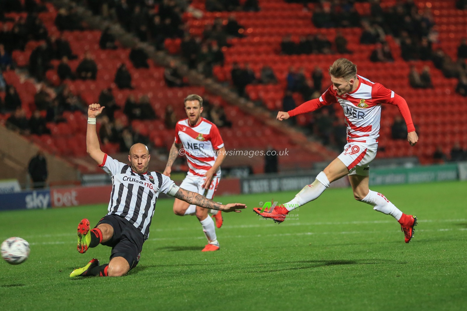 20th November 2018, Keepmoat Stadium, Doncaster, England; The Emirates FA Cup, Round 1, Doncaster Rovers v Chorley ; Alfie May (19) of Doncaster scores to make it 4-0
Credit: Mark Cosgrove/News Images

English Football League images are subject to DataCo Licence