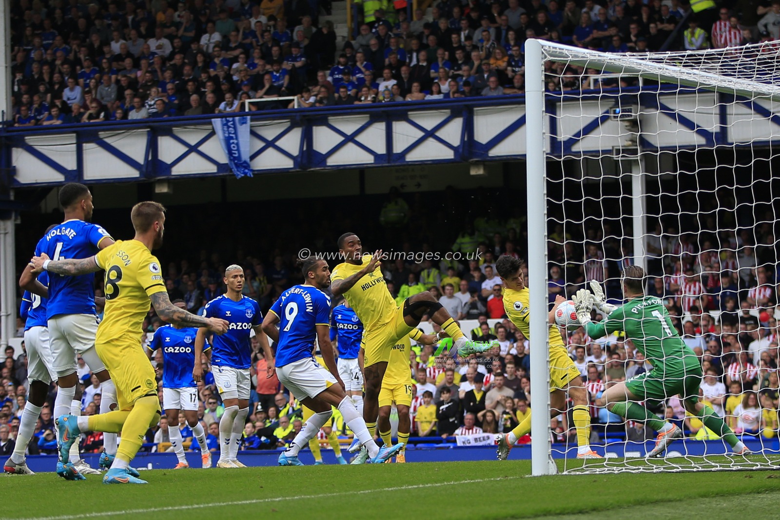 Jordan Pickford #1 of Everton makes a save from Ivan Toney #17 of Brentford