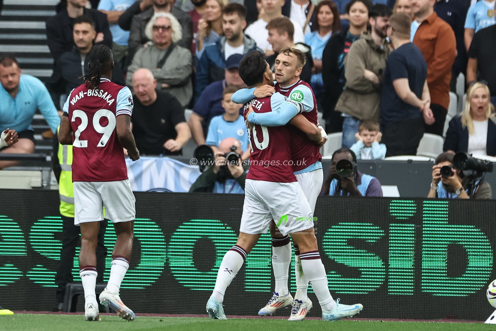 Lucas PaquetÃ¡ of West Ham United and Jarrod Bowen of West Ham United celebrate the own goal of RÃºben Dias of Manchester City during the Premier League match West Ham United vs Manchester City at London Stadium, London, United Kingdom, 31st August 2024

(Photo by Mark Cosgrove/News Images)